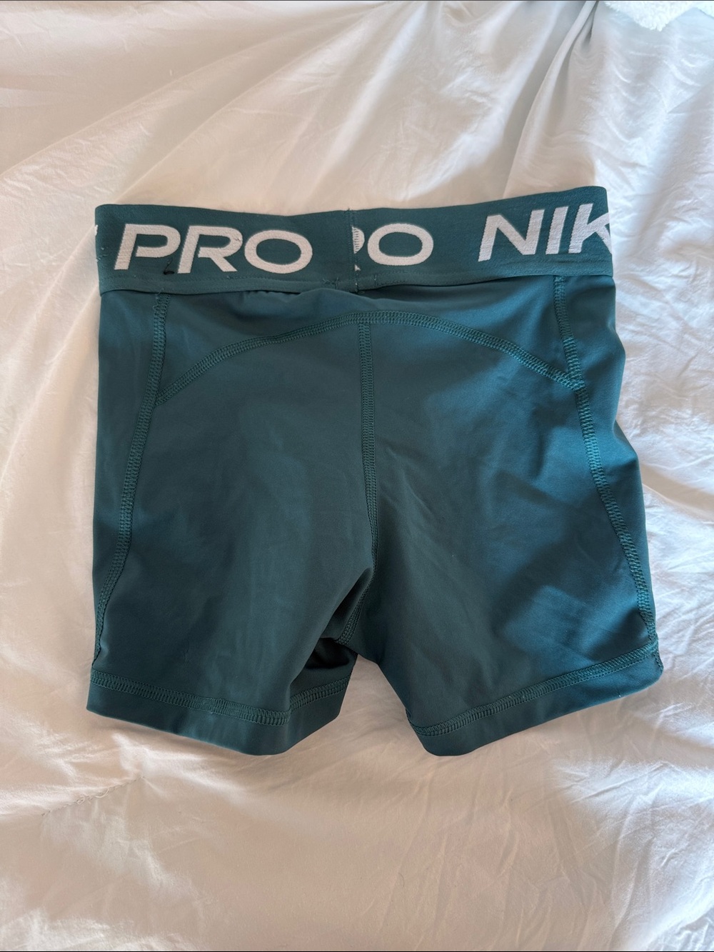 Nike Women's Teal Bike Shorts with White Logo - Picture 3 of 3